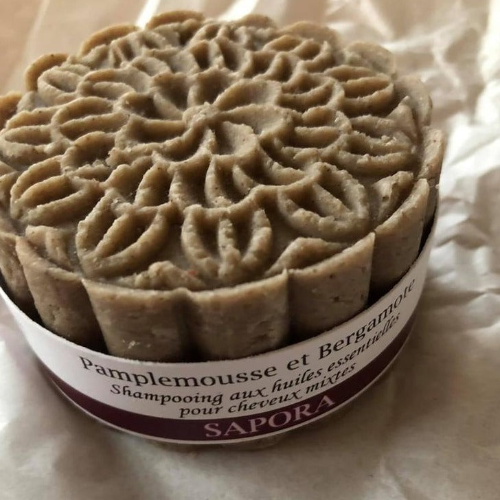 Shampooing solide naturel aux huiles essentielles de pamplemousse et bergamote, tonifiant et purifiant.